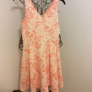 Coral dress with white textured detail